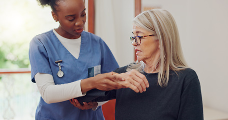 Image showing Physical therapy, senior woman and arm injury with stretching at retirement home for wellness and healthy. Medical, worker and caregiver with consultation at clinic with help and chiropractor support