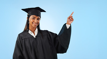 Image showing Graduate student, portrait or happy woman point at school direction, university ads or college learning, knowledge or academy. Mockup space, graduation studio or education decision on blue background