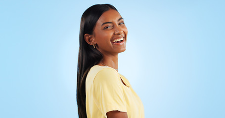 Image showing Woman, happy and beauty portrait for student with confidence, gen z aesthetic and blue background. Indian person, face and smile in trendy fashion for cosmetics, make up and excited in studio mockup