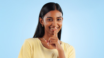 Image showing Secret, portrait and woman with finger on lips, gossip and announcement with emoji on a blue background. Person, face or model with privacy, mockup space or drama news with surprise, whisper or shush