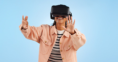 Image showing Virtual reality, hands on screen and woman with future technology and smile in studio on blue background. Hologram, 3D and metaverse, digital world and high tech with user experience and VR software