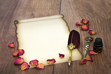 Image showing Parchment Paper Scroll with Rose Petals for Valentines Love Lett