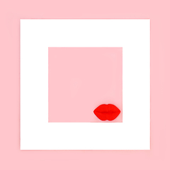 Image showing Luscious Red Lips with White Frame on Pink Background 