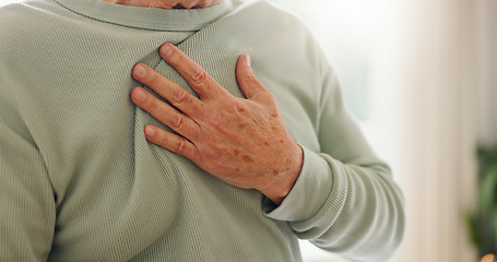 Image showing Heart attack, cardiology and person hand on chest with pain, sick and cardiovascular closeup. Indigestion, heartburn and health with wellness, elderly care with medical issue and hypertension