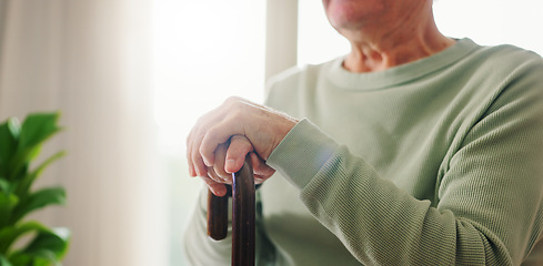 Image showing Hands, old person with disability and walking stick, closeup with wellness and retirement. Senior care, cane to help with balance and support, Parkinson disease or arthritis, sick and health issue