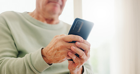 Image showing Home, closeup and senior hands with a cellphone, typing and connection with social media, digital app and contact. Old man, pensioner or mature guy with a smartphone, mobile user and search internet