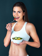 Image showing Salad, woman and eating portrait with fitness, health and nutrition of meal with a smile in studio. Workout, happy and female model with exercise and training with healthy diet food and vegetables