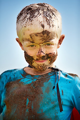 Image showing Boy, child and mud on face with smile from playing, dirt or happiness in summer weather or water. Kid, person and portrait with satisfaction for messy or dirty fun outdoor in sunshine or garden