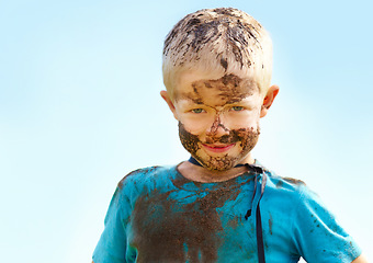 Image showing Boy, kid and mud on face with smile from playing, dirt or happiness in summer weather or water. Child, person and portrait with satisfaction for messy or dirty fun outdoor in sunshine or garden