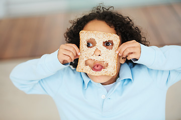 Image showing Child, playful or face food mask or bread funny, nutrition hungry or eating health value. Boy, tongue or brown diet fibre for kid vitality cooking or meal prep dinner humor for snack, lunch or comedy