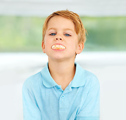 Image showing Child, portrait and orange slice fruit or health wellness snack, vitamin c or raw food youth development. Boy, kid and face fresh diet or organic citrus nutrition, fibre breakfast or morning minerals