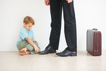 Image showing Sad, child and businessman to leave for work, anxiety and tantrum, stop dad for care, support and love. Father, mental health or kid stress on floor for help, professional and headache or depression