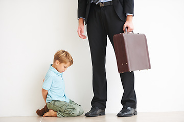 Image showing Man, work and child on floor with sad, love and care by businessman for fear, anxiety and tantrum. Father, tired and professional career in house to help, support and burnout kid in mental health