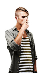 Image showing Model, studio and man smoking a cigarette for stress, toxic addiction or unhealthy habit to relax. Dangerous, smoker or male person in Germany to inhale tobacco isolated by a white background alone