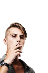 Image showing Portrait, mockup or man smoking a cigarette for stress, toxic addiction or unhealthy habit to relax. Dangerous, smoker or male person in Germany to inhale tobacco on white background or studio space