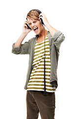 Image showing Singing, music and man with headphones in studio white background streaming audio online. Radio, sound and person screaming and listening to rock, metal or hip hop track on technology with energy