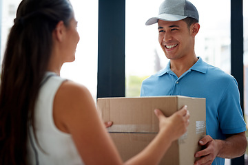 Image showing Front door, delivery guy or box of a happy customer for ecommerce distribution or online shopping. Shipping services, home or friendly courier man giving cardboard parcel, product or package to woman