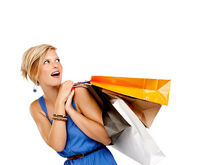 Image showing Woman, wow and shopping bag for discount, sale and retail giveaway or competition on a white background. Happy customer or excited person with surprise for announcement, winning and fashion in studio