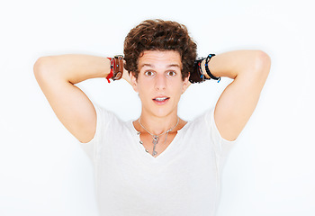 Image showing Shock, accessories or portrait of person in studio on white background for fashion, swag or unique style. Wow, man or bracelet jewellery on a young punk male model for trendy or edgy expression