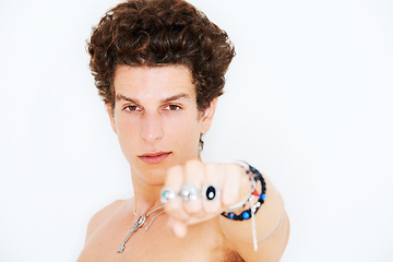 Image showing Portrait, fist bump and a shirtless man in studio isolated on a white background for masculine power. Face, hand and confidence with a gesture of unity or solidarity from a young model looking tough