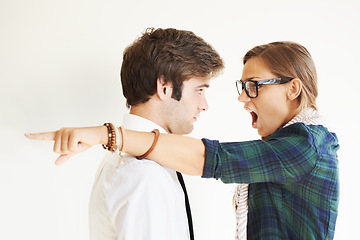 Image showing Couple, screaming and fight, divorce and pointing in studio isolated on white background. Woman shout, breakup and man frustrated, angry at relationship fail or cheating, stress and marriage conflict