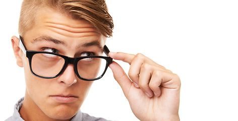 Image showing Glasses, question and young man in a studio with confused, doubt or decision facial expression. Optometry, guess and male person from Canada with spectacles or eyewear isolated by white background.