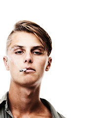 Image showing Portrait, face and man smoking cigarette isolated against a white studio background. Cool, attractive or handsome male person, model or smoker chilling or having a casual smoke on mockup space