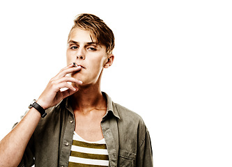 Image showing Portrait, space or model smoking a cigarette for stress, toxic addiction or unhealthy habit to relax. Dangerous, smoker or cool man in Germany to inhale tobacco on white background or studio mockup