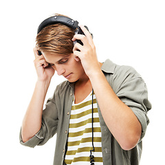 Image showing Man, headset and listening to music for podcast, audio streaming or DJ against a white studio background. Male person or sound artist with headphones for beats, songs or playlist on mockup space