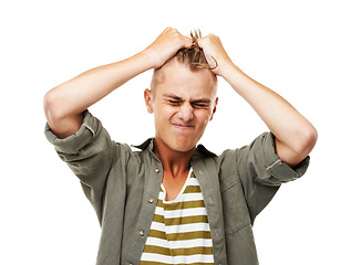 Image showing Frustrated, man and pulling hair in anger, stress or anxiety for mistake, fail or crisis in college. Studio, university student and angry from loss of work, burnout or disaster in white background