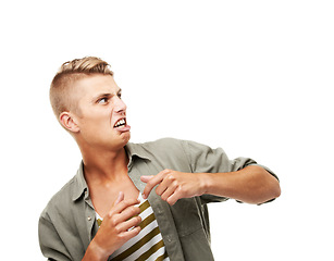 Image showing Anger, frustrated and a man on a white background with fear, scared and horror expression. Mockup, anxiety and a person looking for danger, nightmare or disgust on a studio backdrop with space