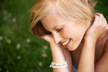 Image showing Thinking, outdoor and woman with nature, happiness and peace with ideas, daydreaming and funny. Park, person and girl with wonder, fresh air and calm with peace, laughing or environment with decision