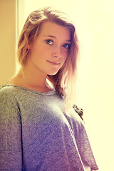 Image showing Portrait, beauty and a young woman in her home to relax on the weekend during a summer morning. Innocent face, calm and retro sunlight with a casual gen z person chilling alone in her apartment