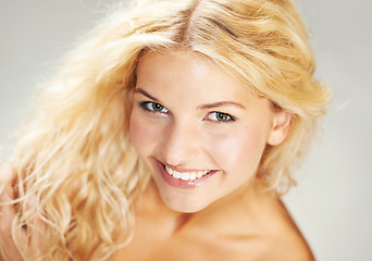 Image showing Portrait, smile and natural beauty of blonde woman in studio isolated on a white background. Face, happy model and skincare of girl in spa facial treatment for wellness, cosmetics and dermatology