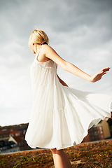 Image showing Dance, countryside and a woman for ballet in summer, freedom and happy on a rooftop. Nature, retro and a young girl or dancer in a field or nature for moving, carefree and pride as a ballerina