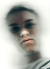 Image showing Portrait, person and face with motion blur for mental health from bottom view in studio on white background. Male model, alone and mindset or anxiety for stress management, depression or suffering