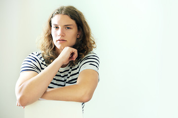 Image showing Studio, portrait and man relax with arms crossed in salon for haircare, dermatology or beauty in white background. Calm, person and thinking about damaged, frizzy hair or treatment for hairstyle