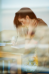 Image showing Woman, thinking and writing in notebook by desk, coffee shop and learning summary in gen z aesthetic. Young, student and idea on paper with pen, planning and textbook with college project research