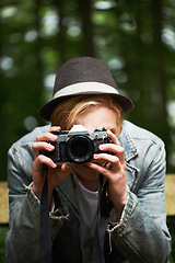 Image showing Photography, nature and man with a camera, travel and tourism with adventure, trees and freedom. Person, photographer and guy with mountains, traveller and retro with landscape, creative and journey