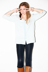 Image showing Fashion, peace sign and portrait of woman in studio with pride, confidence and emoji. Cosmetics, hand gesture and isolated person in trendy clothes, casual outfit and style on a white background