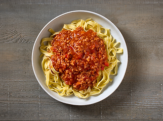 Image showing bowl of pasta tagliatelle with bolognese sauce