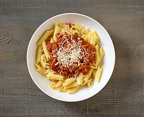 Image showing bowl of pasta penne with sauce bolognese