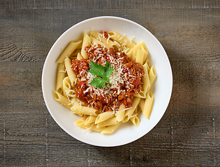 Image showing bowl of pasta penne with sauce bolognese