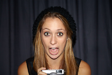 Image showing Shock, photography and portrait of woman with camera for creative and art career by curtain. Surprise, scream and young female person from Australia with wow or omg face expression and dslr equipment