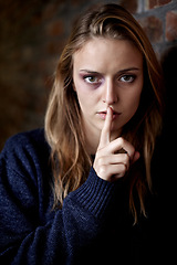 Image showing Portrait, finger on the lips and woman with abuse, scared and fear with depression, anxiety and mental health. Face, person and girl with gesture, silence and victim with crisis, terror and horror