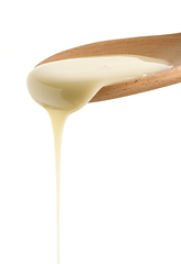 Image showing pouring condensed milk