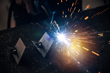 Image showing Sparks in metalworking.