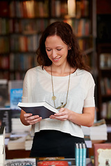 Image showing Woman, bookshop and reading with sale, shopping and thinking for decision, smile and learning with ideas. Girl, novel or literature in store, library and college with deal, discount for knowledge