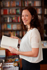 Image showing Woman, bookstore and portrait with sale, happy and pride for decision, choice or knowledge. Girl, novel and smile for literature in store, library or college with retail deal, discount and shopping