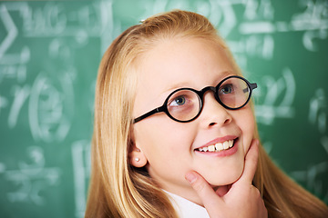 Image showing Thinking, idea and child student with glasses by board for planning, decision or brainstorming in classroom. Education, learning and girl kid with choice, vision or solution face expression in school